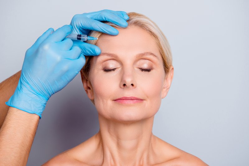 Mature woman getting BOTOX injections