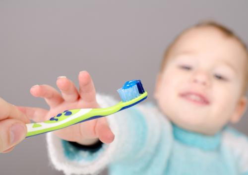 What should I use to clean my baby’s teeth?